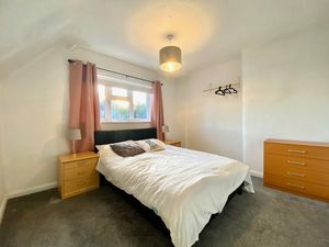 Bedroom One- click for photo gallery